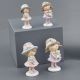 STATUINE BAMBINE CON CAPPELLO ASSORTITE IN DUE VARIANTI BOMBONIERE NASCITA ORIGINALI BATTESIMO FEMMINA